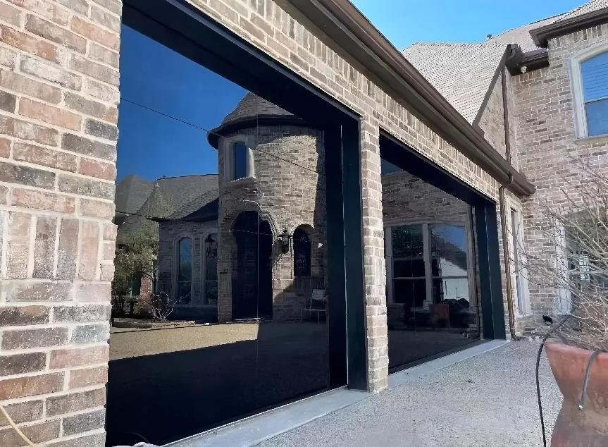 Residential Garage Door with Black Glass Panels