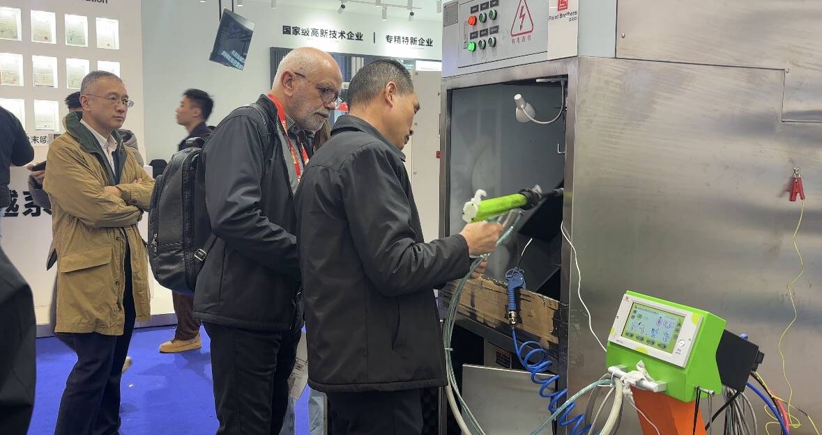 QXD Coating team meeting international clients at 2024 Shanghai Surface Treatment Expo