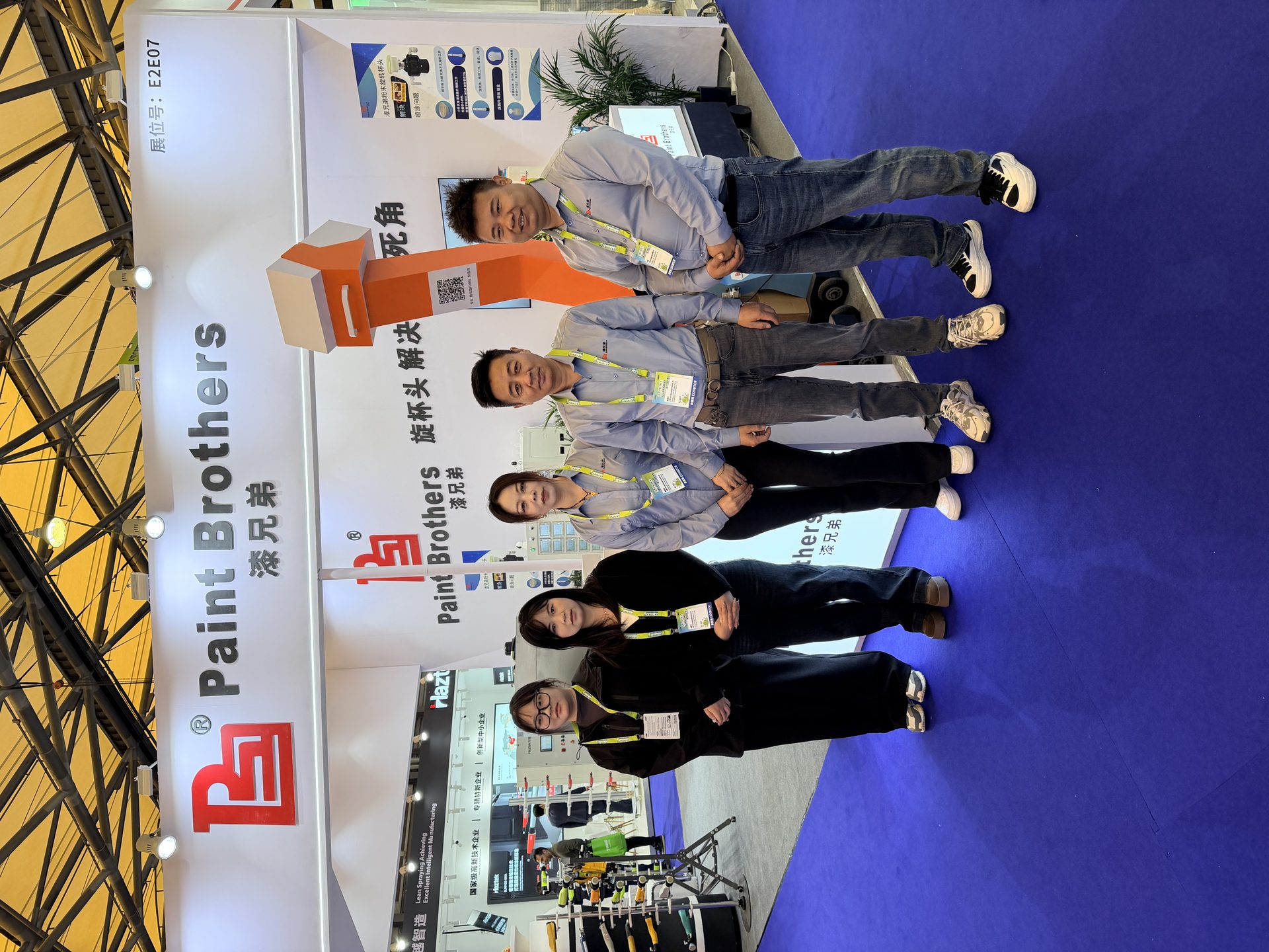 The Paint Brothers team at an industrial coating equipment trade show exhibition