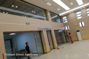 Guishan School Auditorium Install grooved acoustic panels
