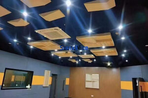 The recording studio uses wall polyester board and solid wood diffuser
