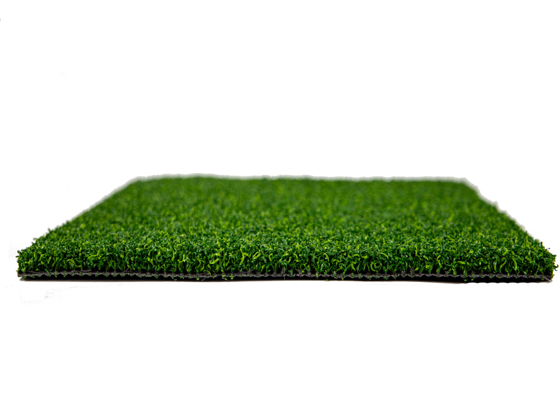 Water permeable football pitch grass